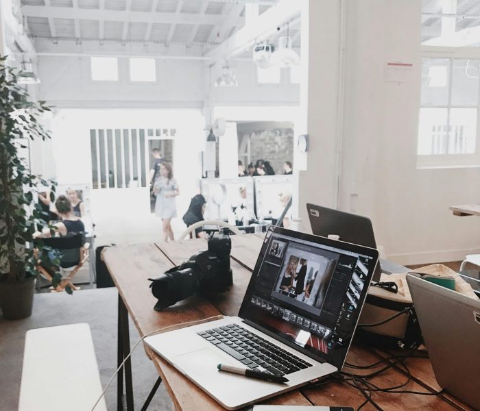 Turned-on Gray Laptop Computer on Table